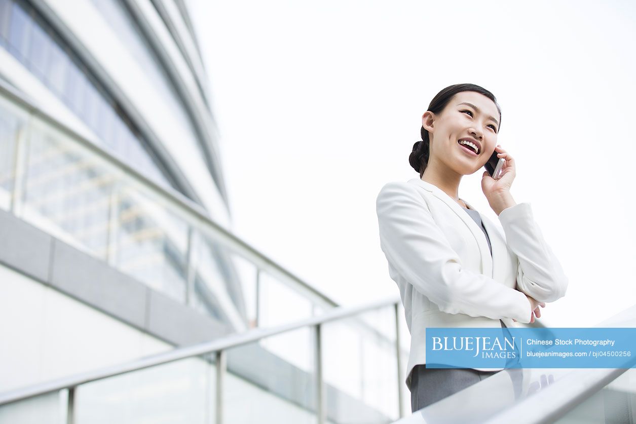 Chinese businesswoman talking on the phone