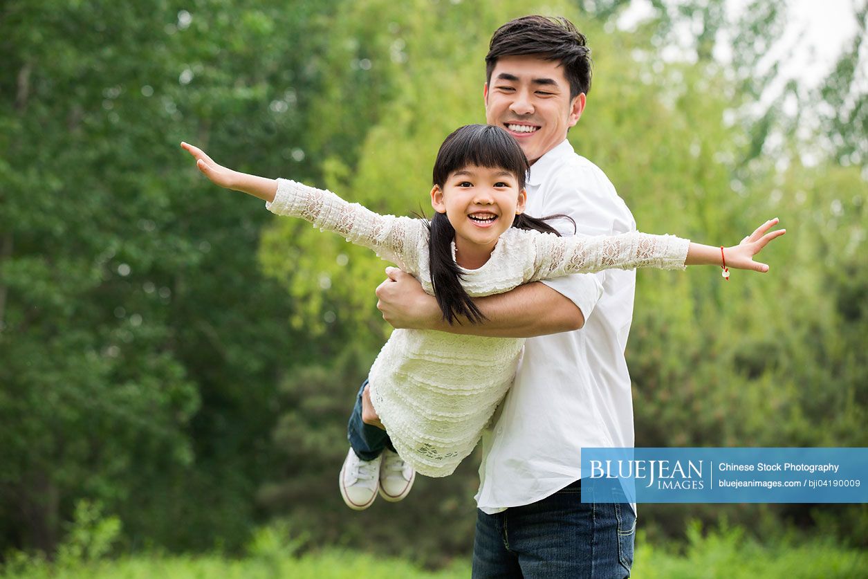 Happy Chinese father and daughter